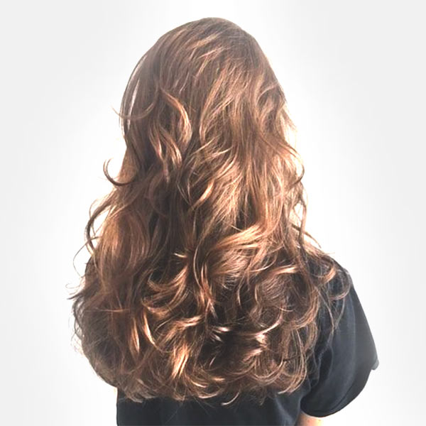 womans curly hair coloring salon plano texas