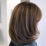 womans short hairstyle side veiw plano texas